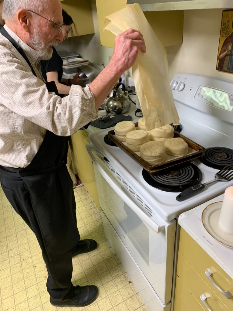 Parchment paper is placed over the prosphora when baking to control browning.